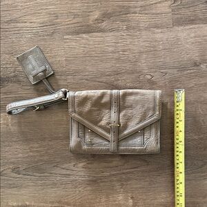 Tory Burch 797 leather envelope clutch in a taupe with wristlet